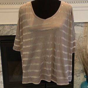 Ladies V neck sheer shirt with striped pattern